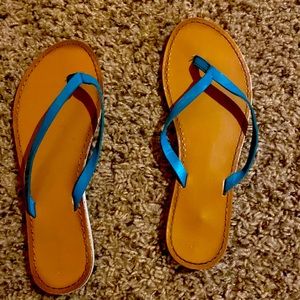 Brown sandals with blue straps